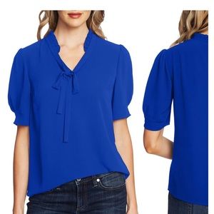 Large Cece blouse. Royal blue with loose bow tie around neck.